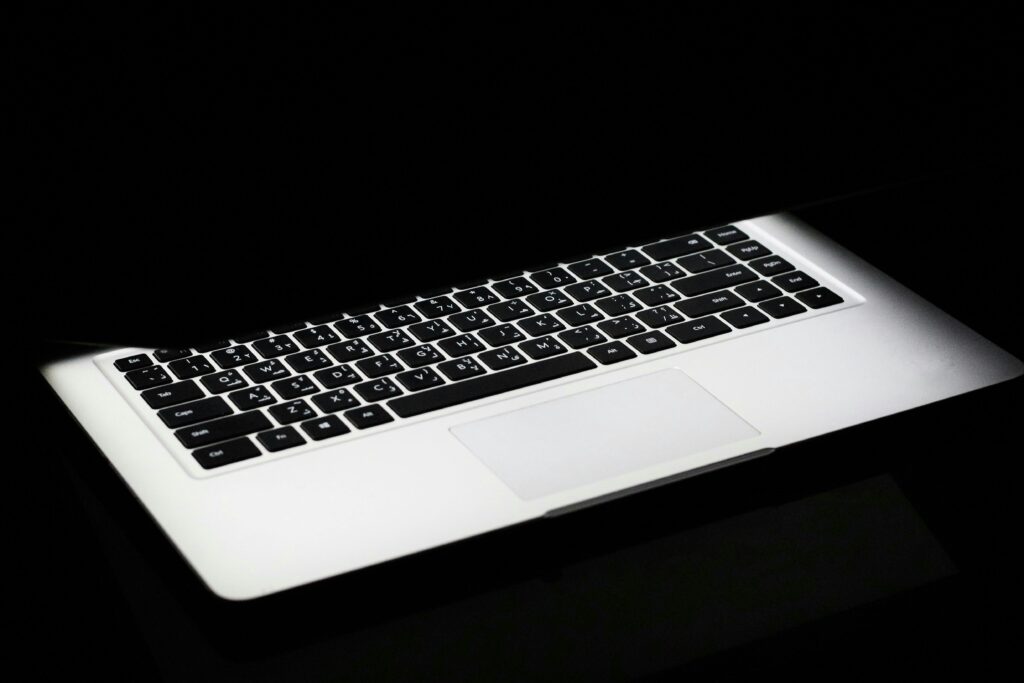 Photography of silver laptops Half Opened
